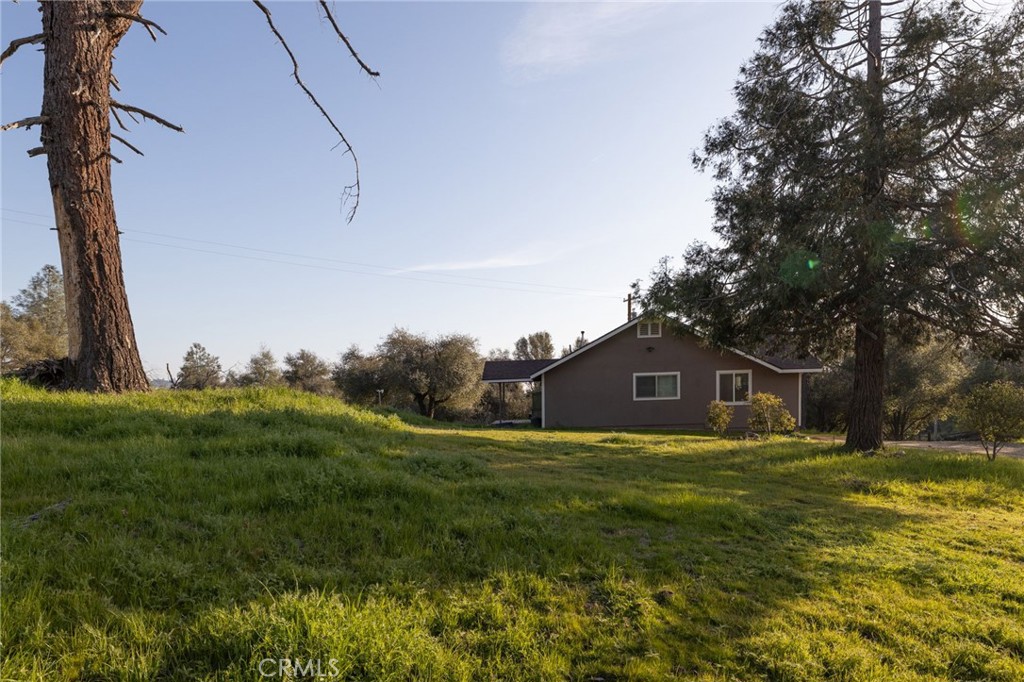 5072 Tip Top Road Mariposa, CA 95338 - Photo 33 of 41 a view of a house with a big yard