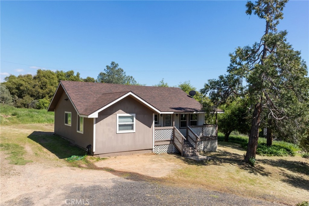5072 Tip Top Road Mariposa, CA 95338 - Photo 36 of 41 a view of a house with backyard