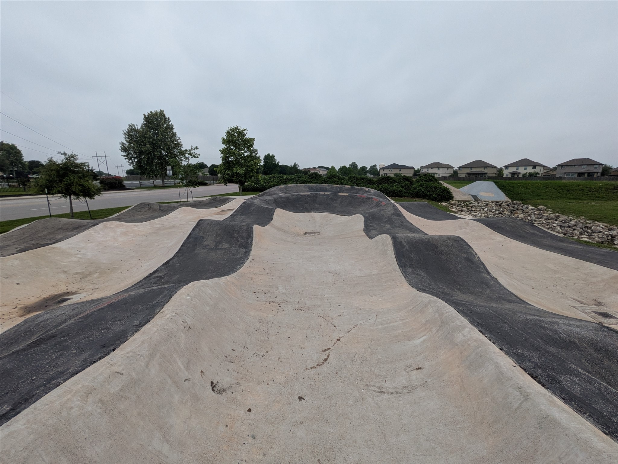 212 Foster Lane Jarrell, TX 76537 - Photo 25 of 26 Recreational space for skate boarding, roller blading, or scooters. Fun for all ages