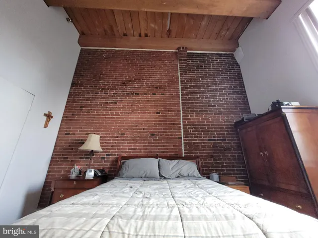 a close view of shoes stand and cabinets