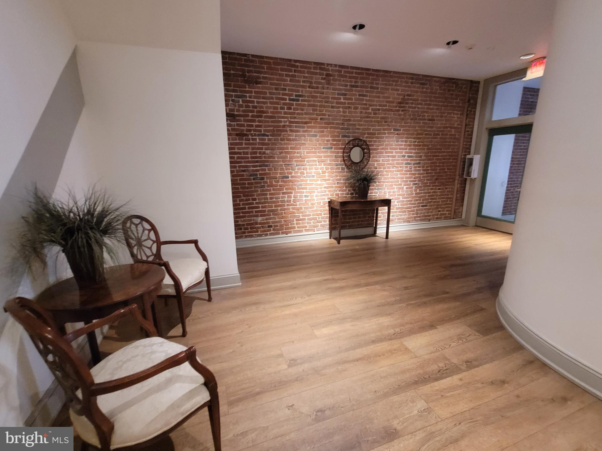 11 North 2nd Street, Unit 306 Philadelphia, PA 19106 - Photo 3 of 42 a view of a livingroom with furniture and a potted plant