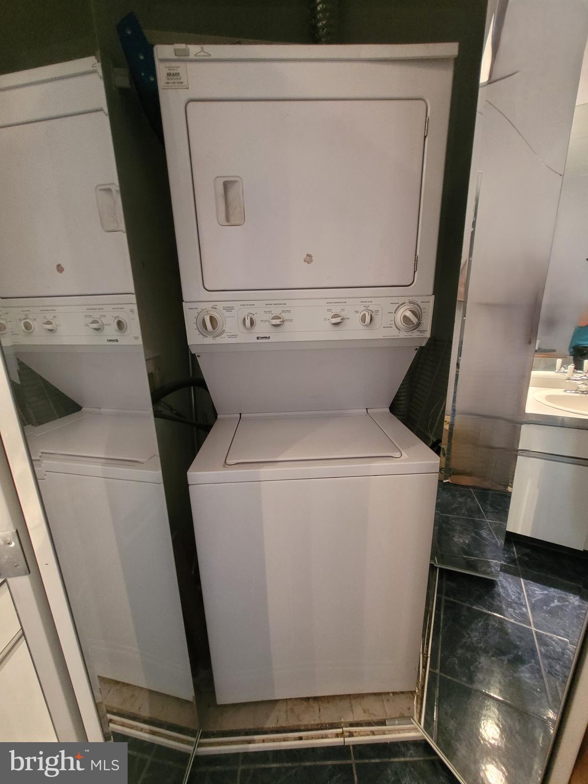 11 North 2nd Street, Unit 306 Philadelphia, PA 19106 - Photo 33 of 42 a utility room with dryer and washer