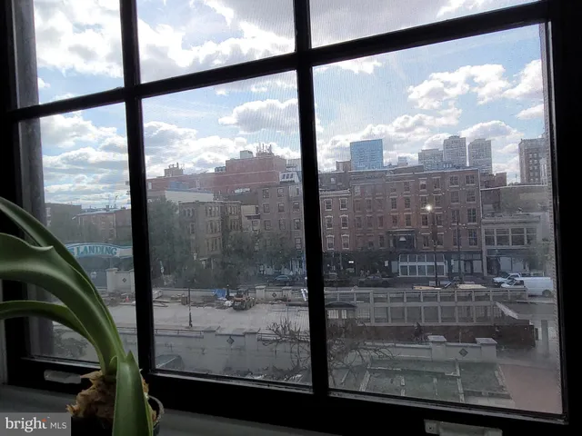 a view of a balcony with city view