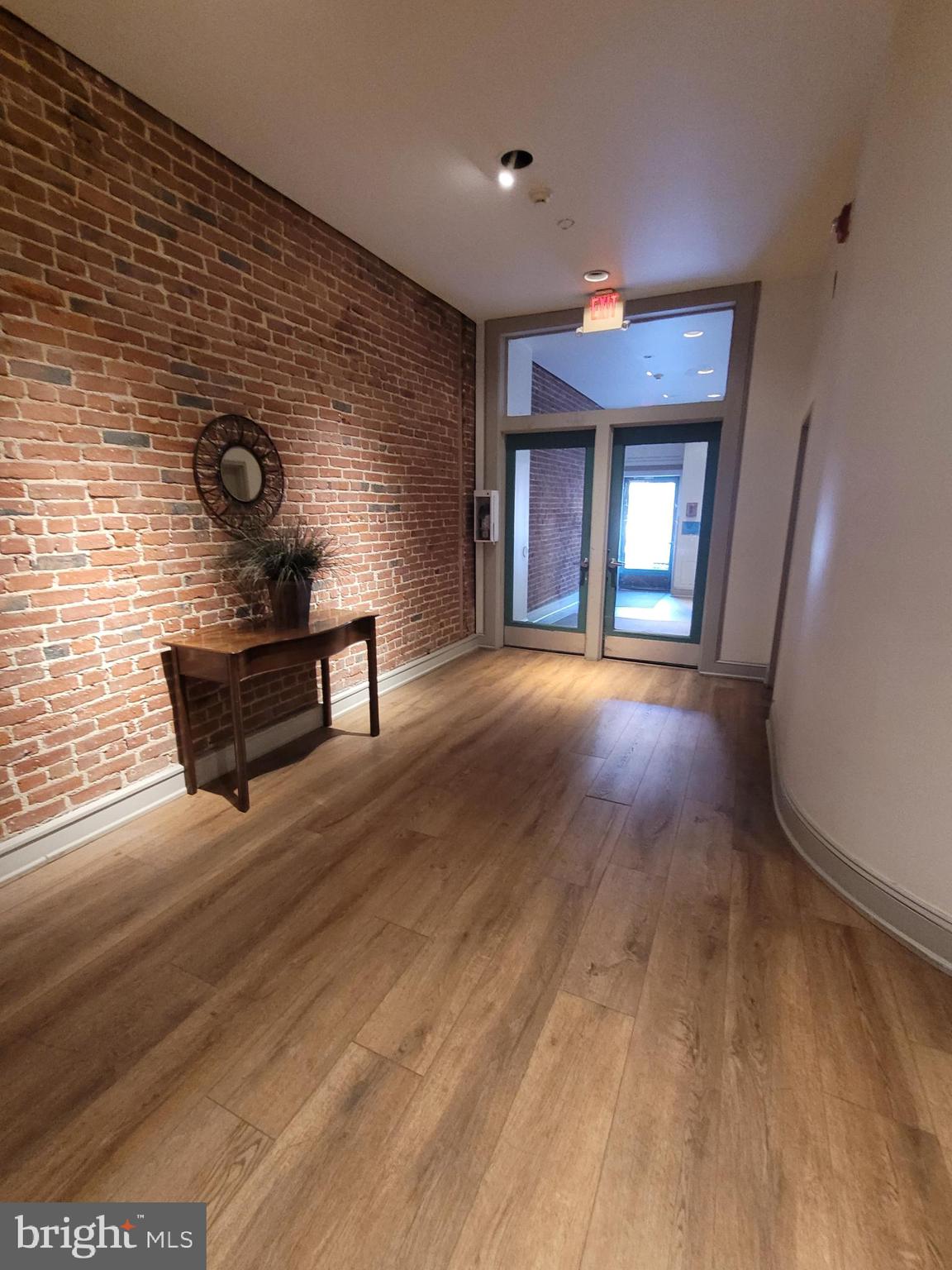 11 North 2nd Street, Unit 306 Philadelphia, PA 19106 - Photo 4 of 42 a view of a livingroom with wooden floor and furniture