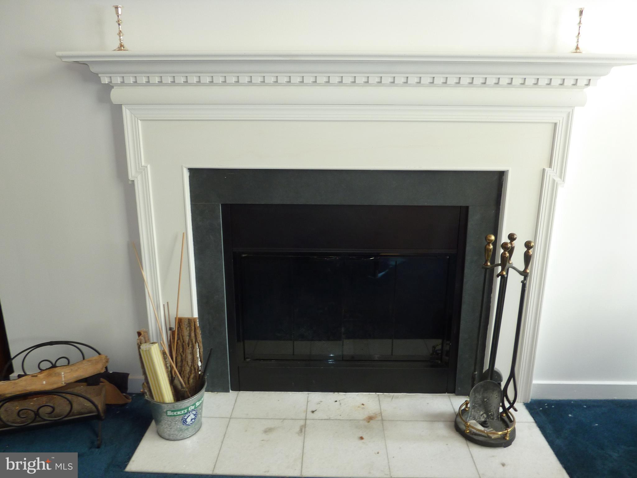 11 North 2nd Street, Unit 306 Philadelphia, PA 19106 - Photo 10 of 42 a living room with a fireplace