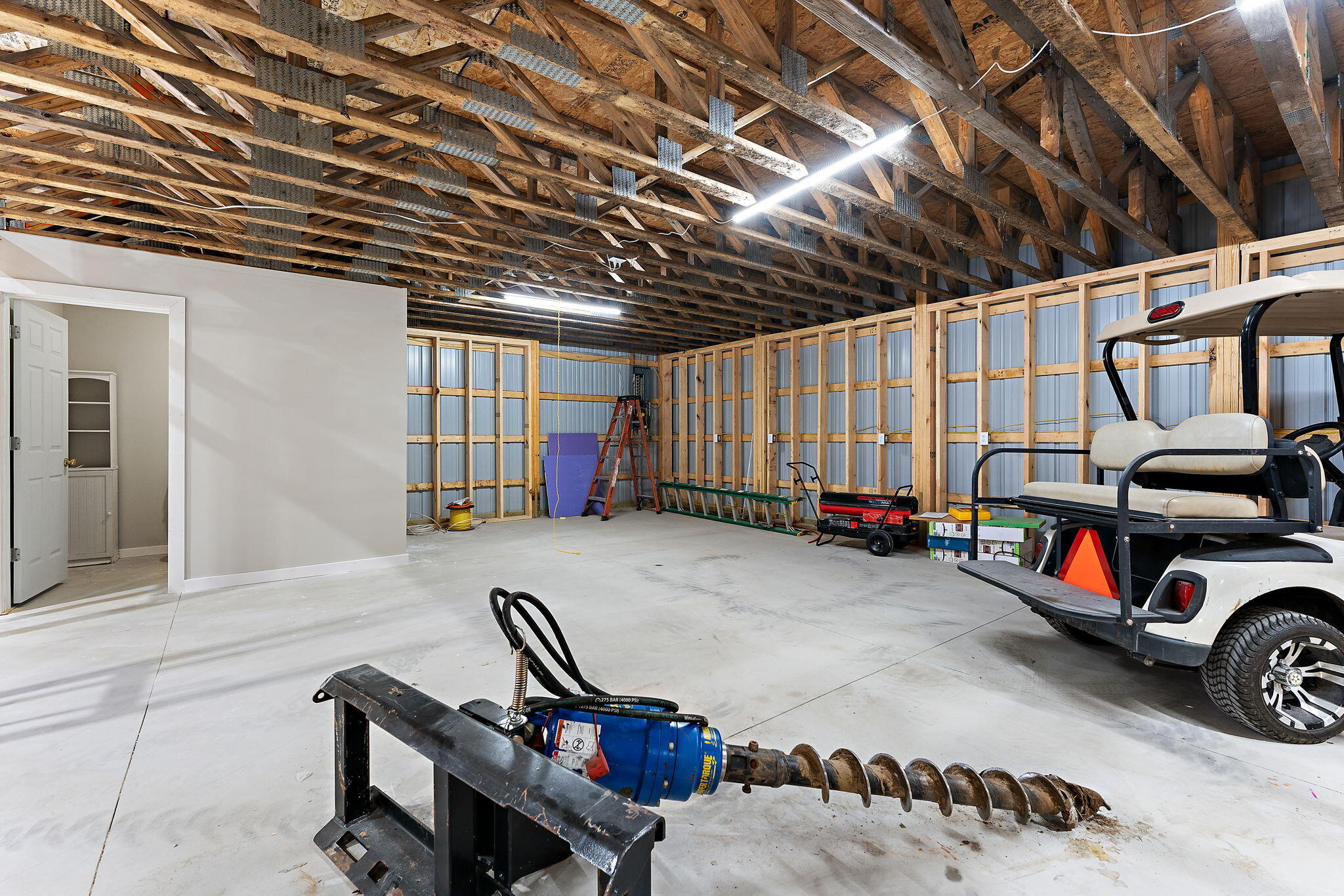 5590 East Maple Street Knox, IN 46534 - Photo 21 of 32 a view of a car garage