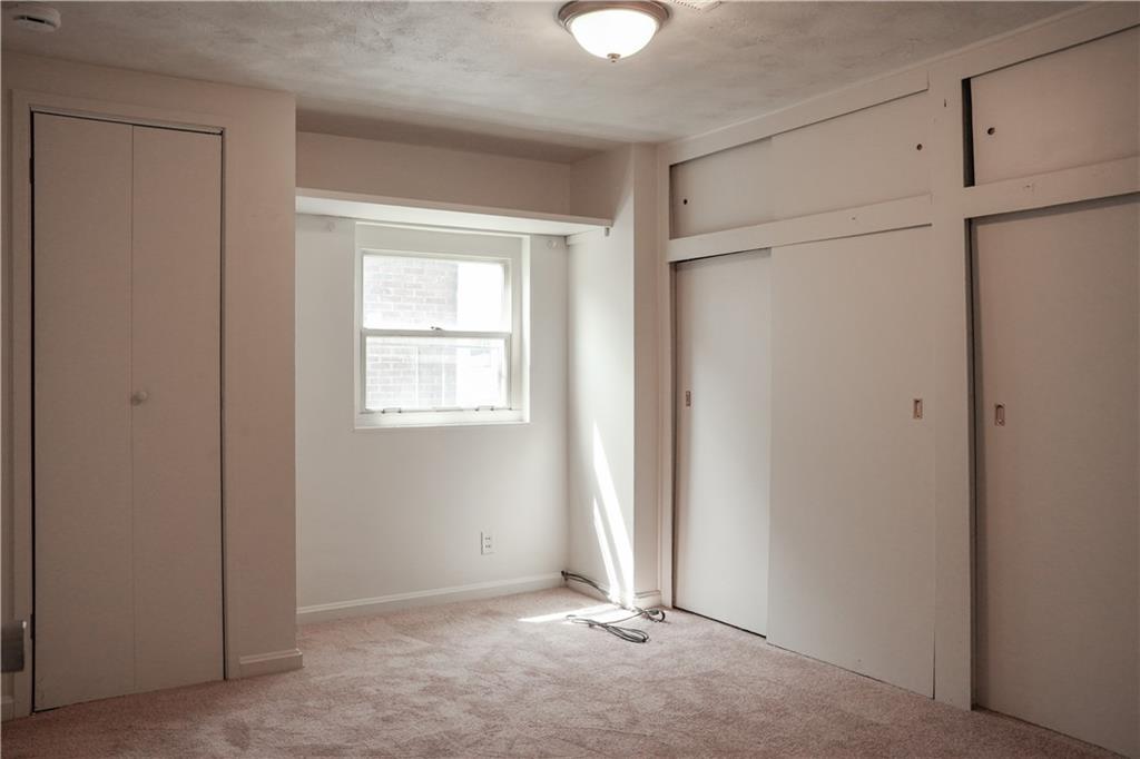 214 12th Street Monaca, PA 15061 - Photo 13 of 20 an empty room with windows