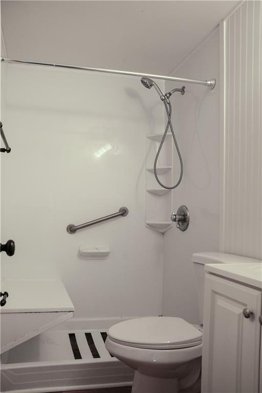 214 12th Street Monaca, PA 15061 - Photo 16 of 20 a bathroom with a toilet and a shower