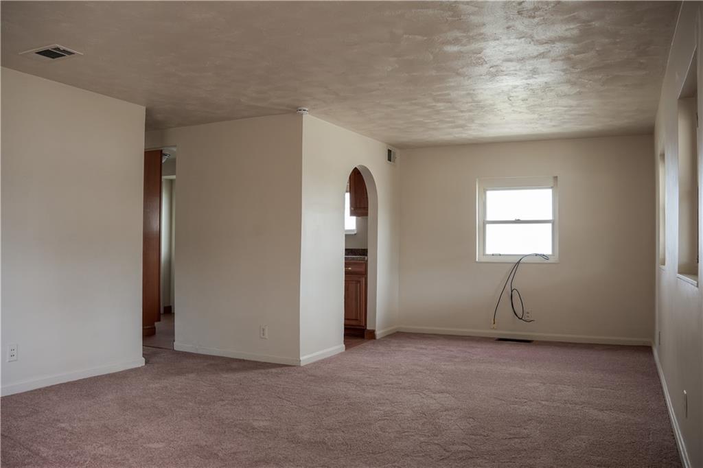 214 12th Street Monaca, PA 15061 - Photo 5 of 20 a view of an empty room with window and closet area