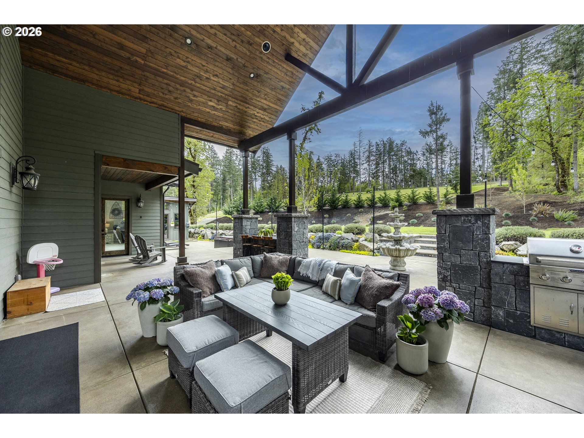 32568 Deberry Road Creswell, OR 97426 - Photo 26 of 41 a living room with patio furniture and a potted plant
