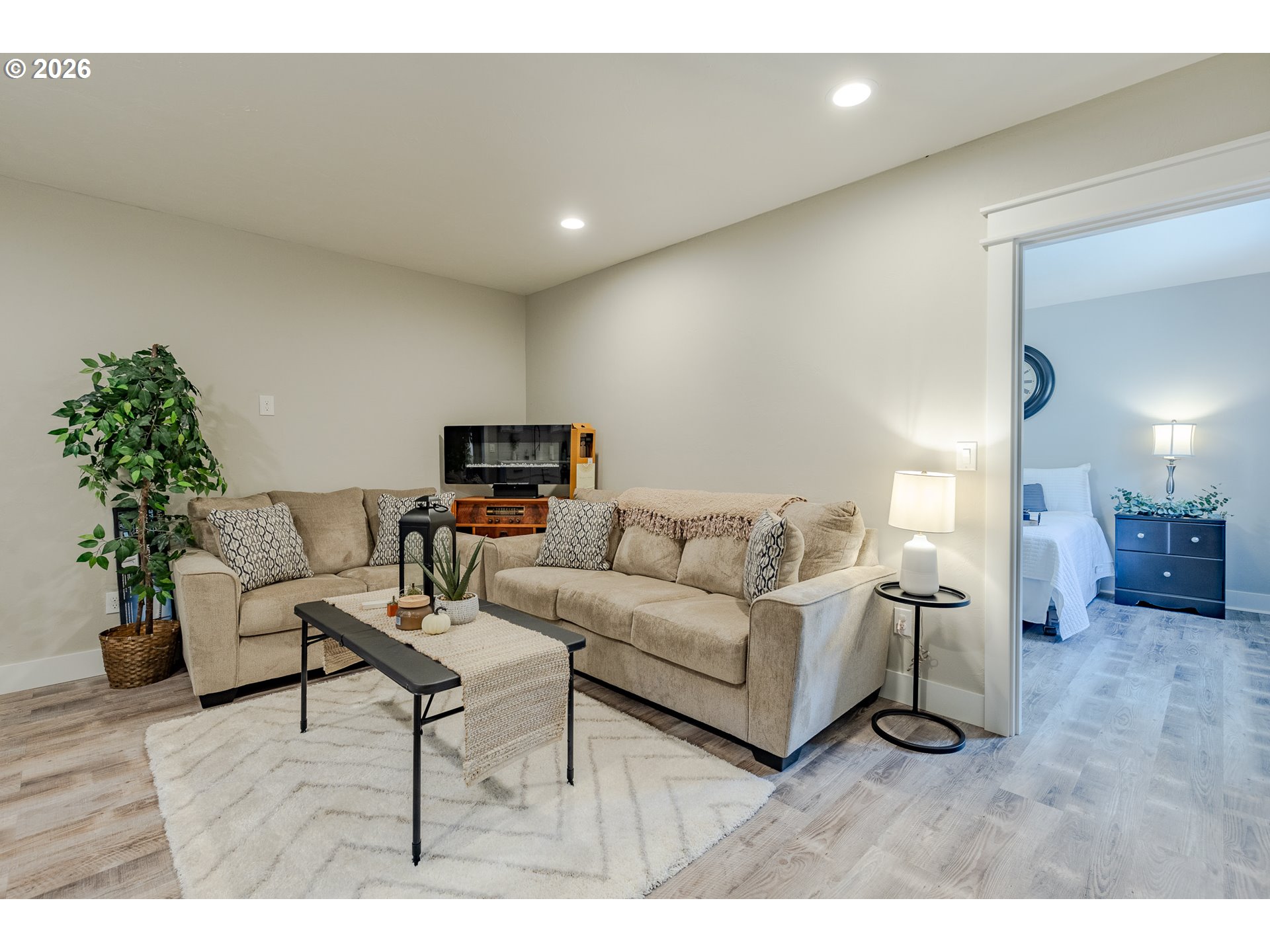 32568 Deberry Road Creswell, OR 97426 - Photo 33 of 41 a living room with furniture and a wooden floor