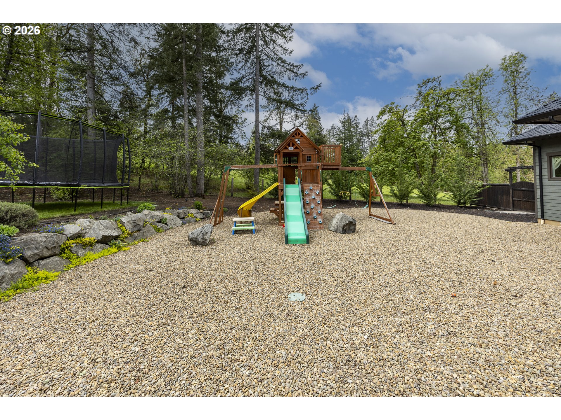 32568 Deberry Road Creswell, OR 97426 - Photo 36 of 41 a view of a park with swings and slides