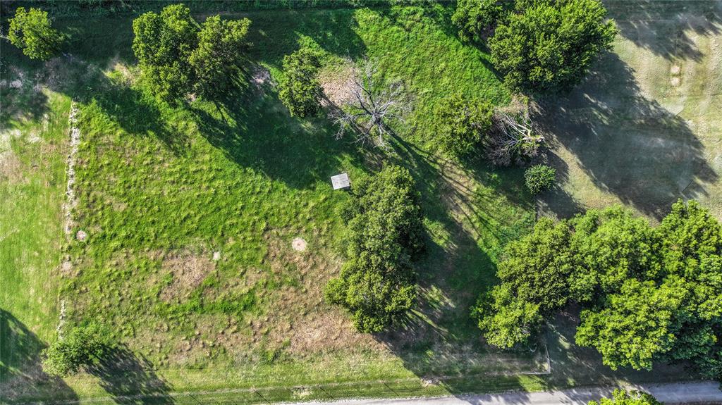 708 West Howell Street St. Jo, TX 76265 - Photo 12 of 14 a view of a garden