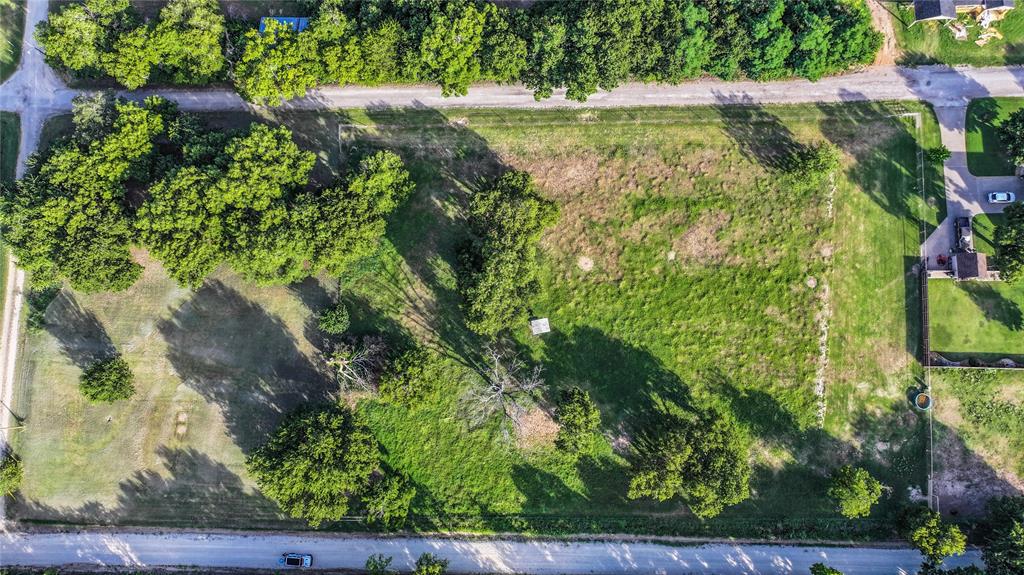 708 West Howell Street St. Jo, TX 76265 - Photo 6 of 14 a view of a yard with plants
