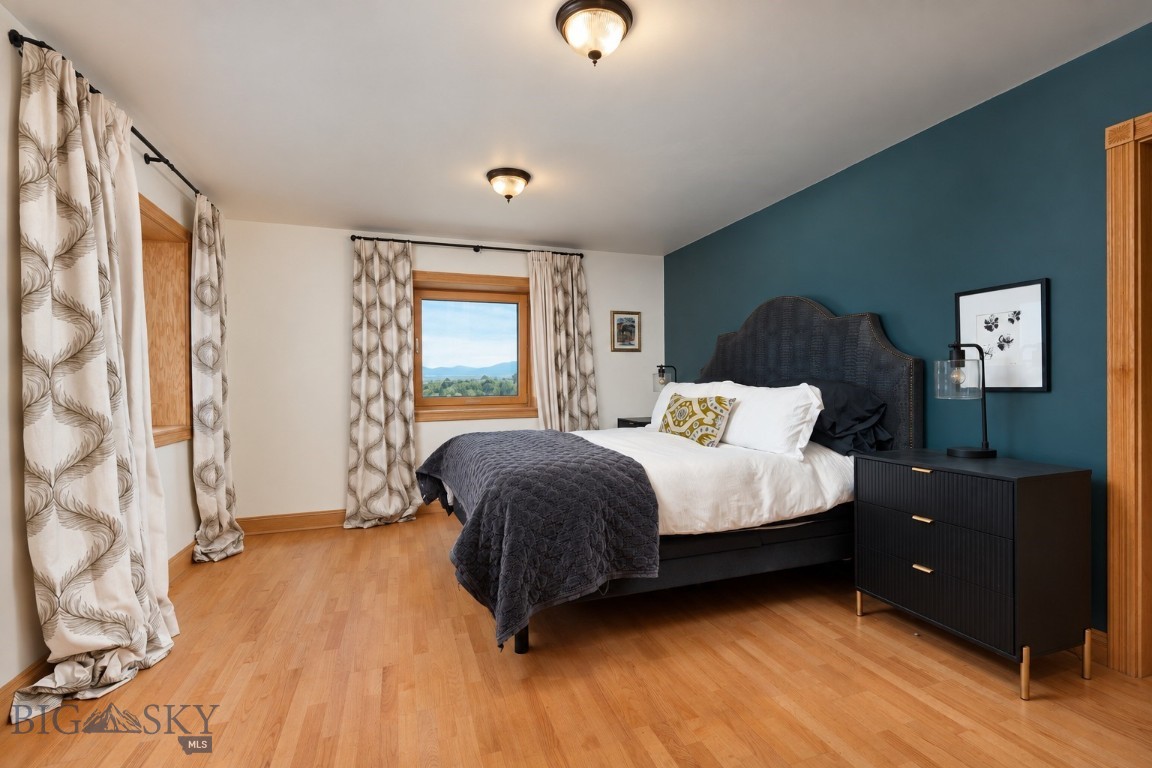 623 River Road Townsend, MT 59644 - Photo 26 of 68 Cottage primary bedroom with river & mountain views