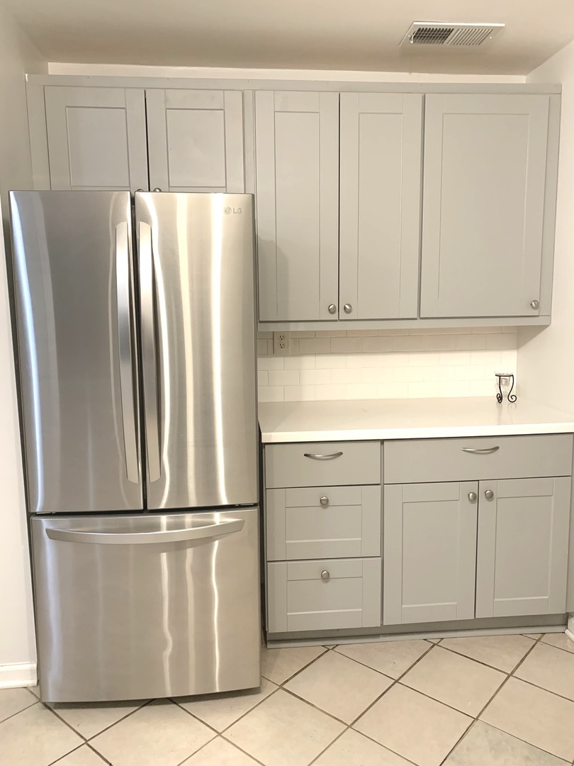 820 Post Lane Streamwood, IL 60107 - Photo 6 of 10 a kitchen with cabinets and stainless steel appliances