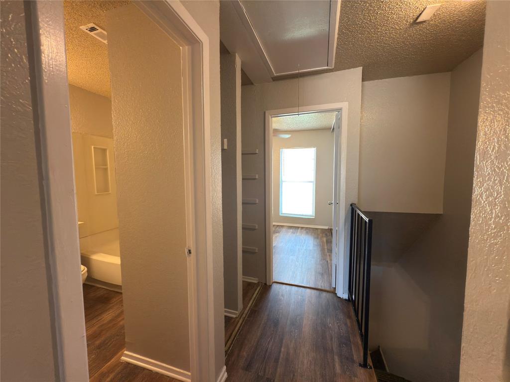 2250 Aspen Drive Dallas, TX 75227 - Photo 14 of 22 a view of a bathroom with a sink and a mirror