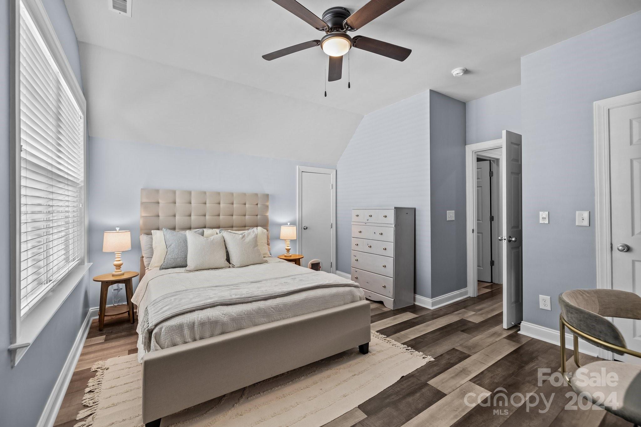 1106 Dove Trace Tega Cay, SC 29708 - Photo 18 of 38 a bedroom with a bed dresser and a window