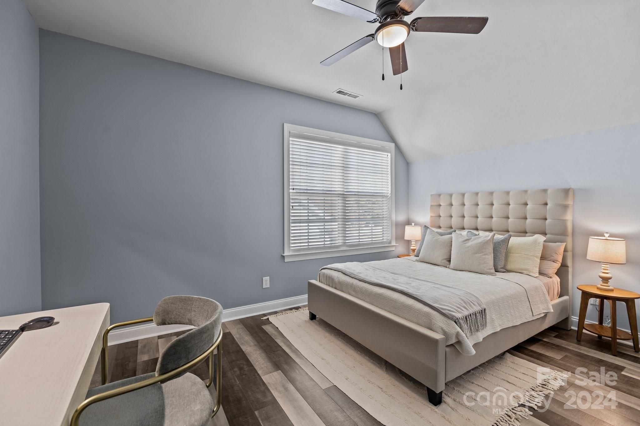 1106 Dove Trace Tega Cay, SC 29708 - Photo 19 of 38 a bedroom with a bed and window