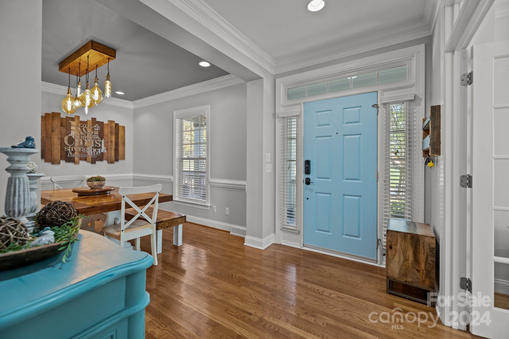 1106 Dove Trace Tega Cay, SC 29708 - Photo 2 of 38 a living room with furniture and a wooden floor