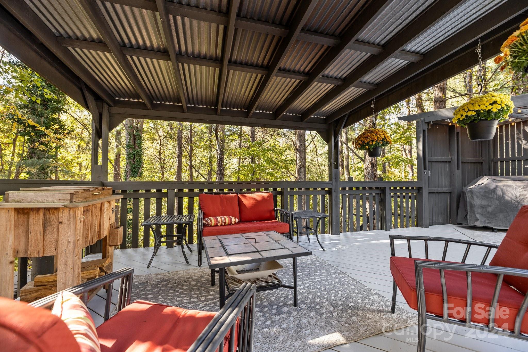 1106 Dove Trace Tega Cay, SC 29708 - Photo 28 of 38 a balcony with chairs and wooden fence