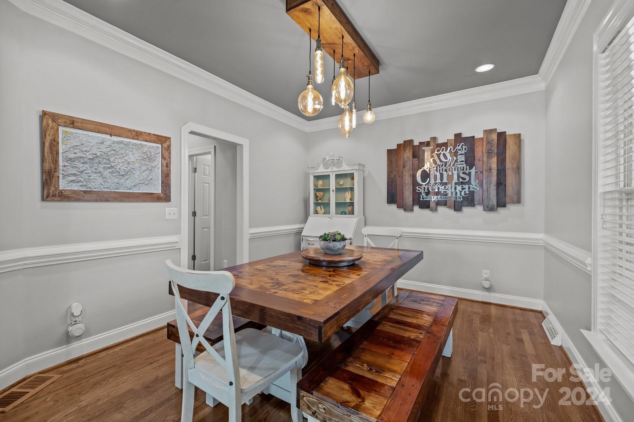 1106 Dove Trace Tega Cay, SC 29708 - Photo 3 of 38 a view of a dining room with furniture window and wooden floor