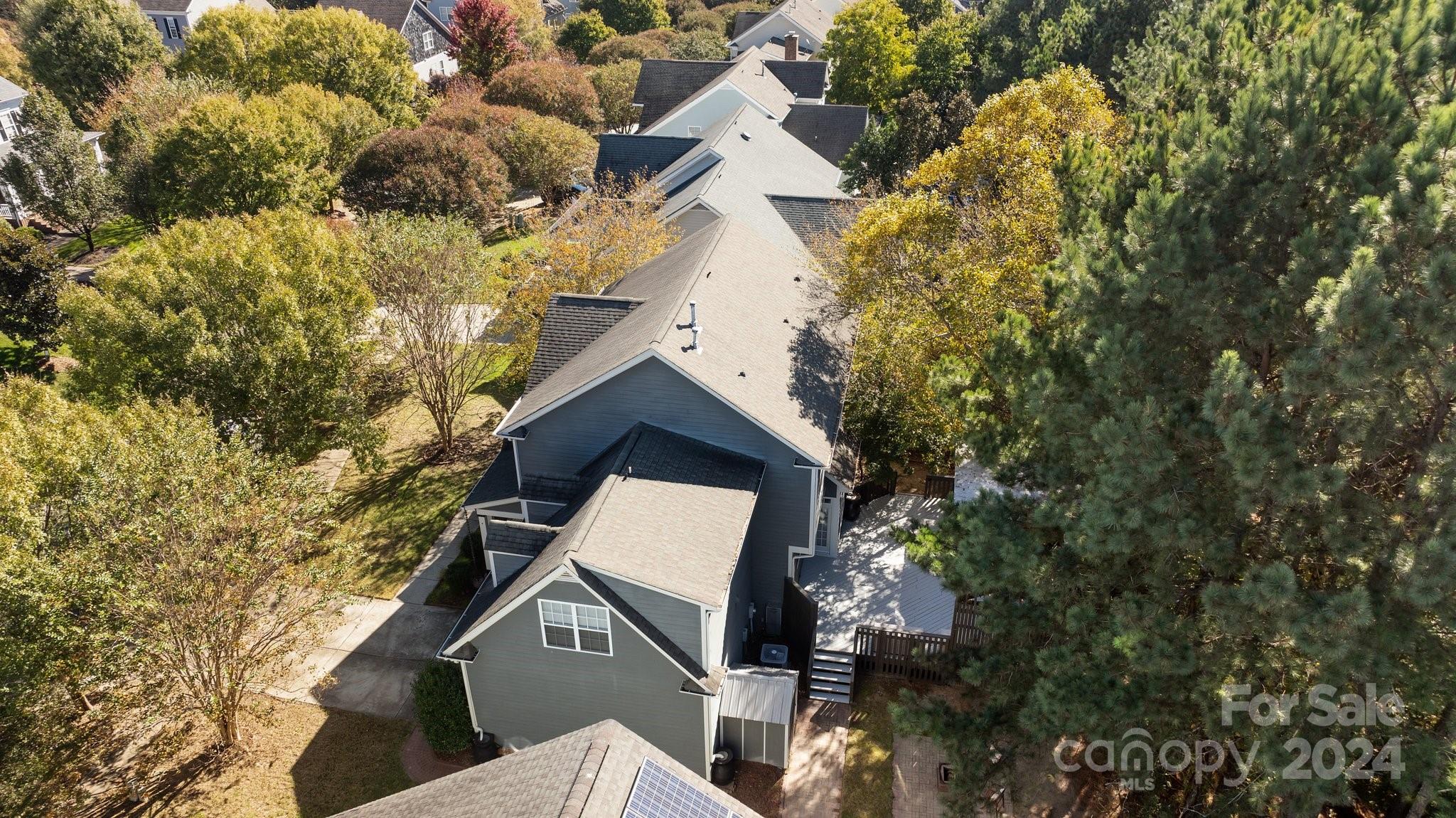1106 Dove Trace Tega Cay, SC 29708 - Photo 32 of 38 a house with trees in front of it