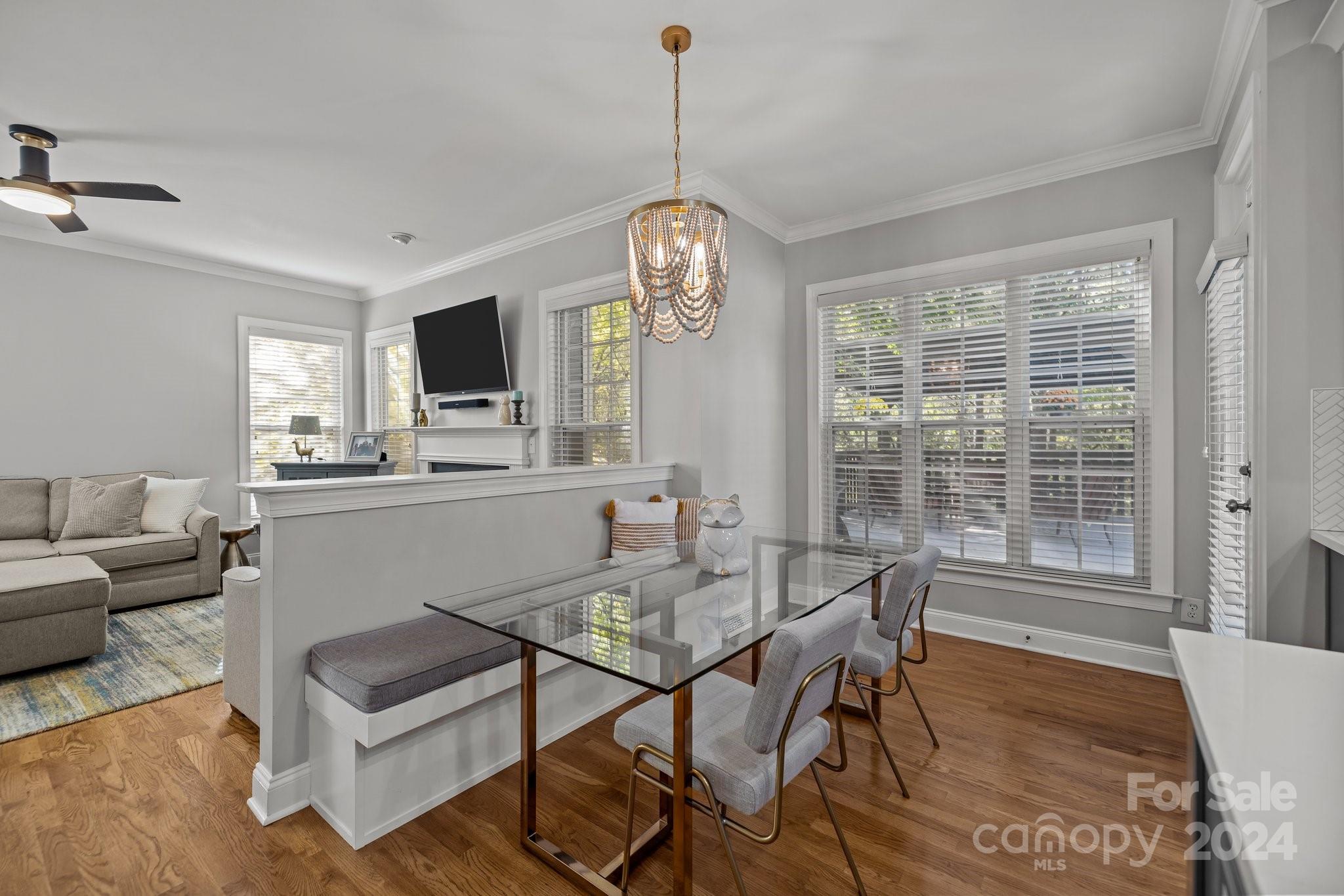 1106 Dove Trace Tega Cay, SC 29708 - Photo 7 of 38 a view of a dining room with furniture window and wooden floor