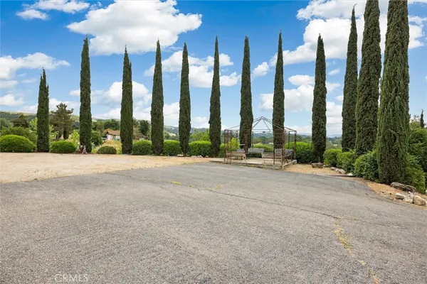 a view of a yard with an outdoor space