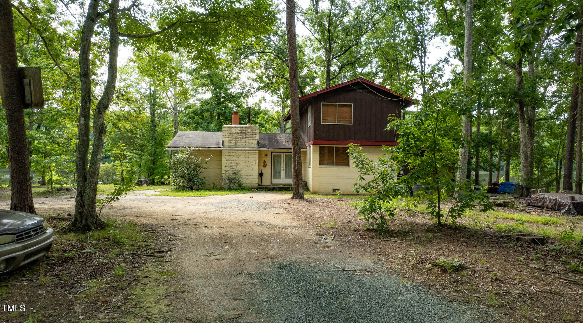 2918-3000 Chestnut Ridge Church Road Efland, NC 27243 - Photo 8 of 23 a view of a house with a yard and tree s