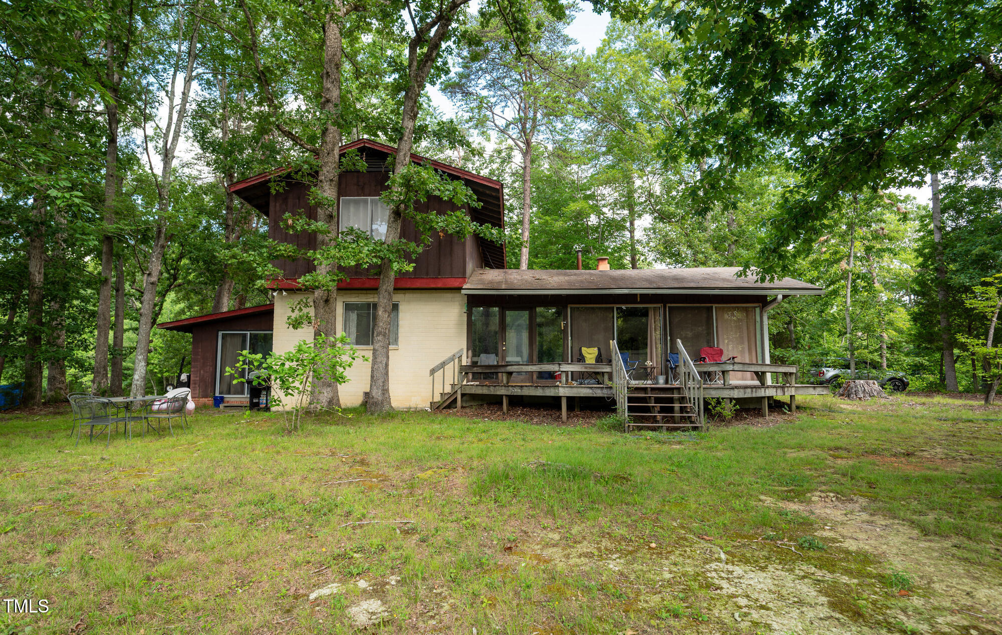 2918-3000 Chestnut Ridge Church Road Efland, NC 27243 - Photo 9 of 23 a view of a house with a yard and sitting area