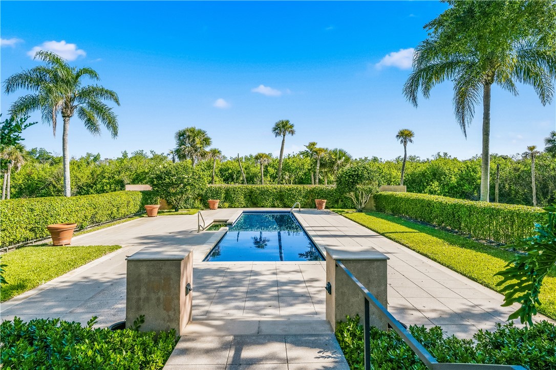 2350 Quay Dock Road Vero Beach, FL 32967 - Photo 27 of 35 a view of swimming pool with a patio