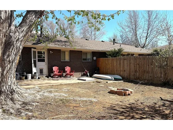 a view of a water pond with outdoor seating