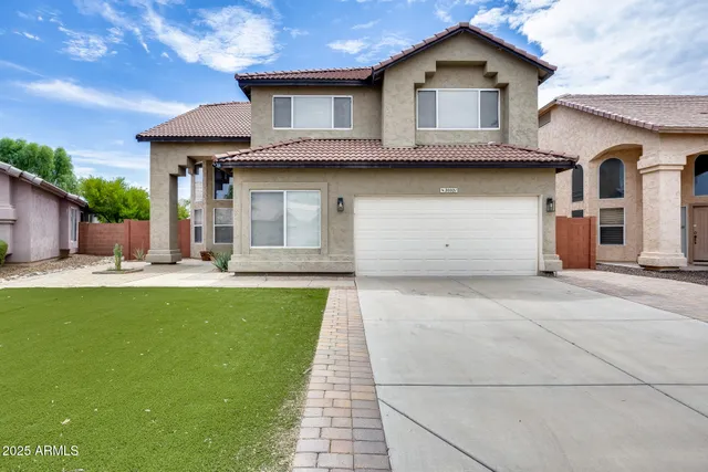 a front view of a house with swimming pool