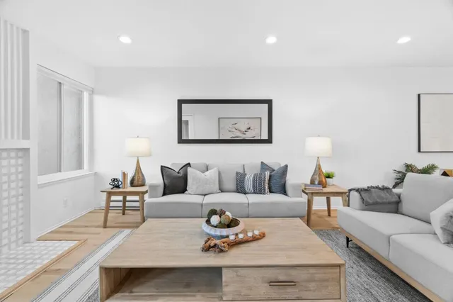 a living room with furniture and a couch