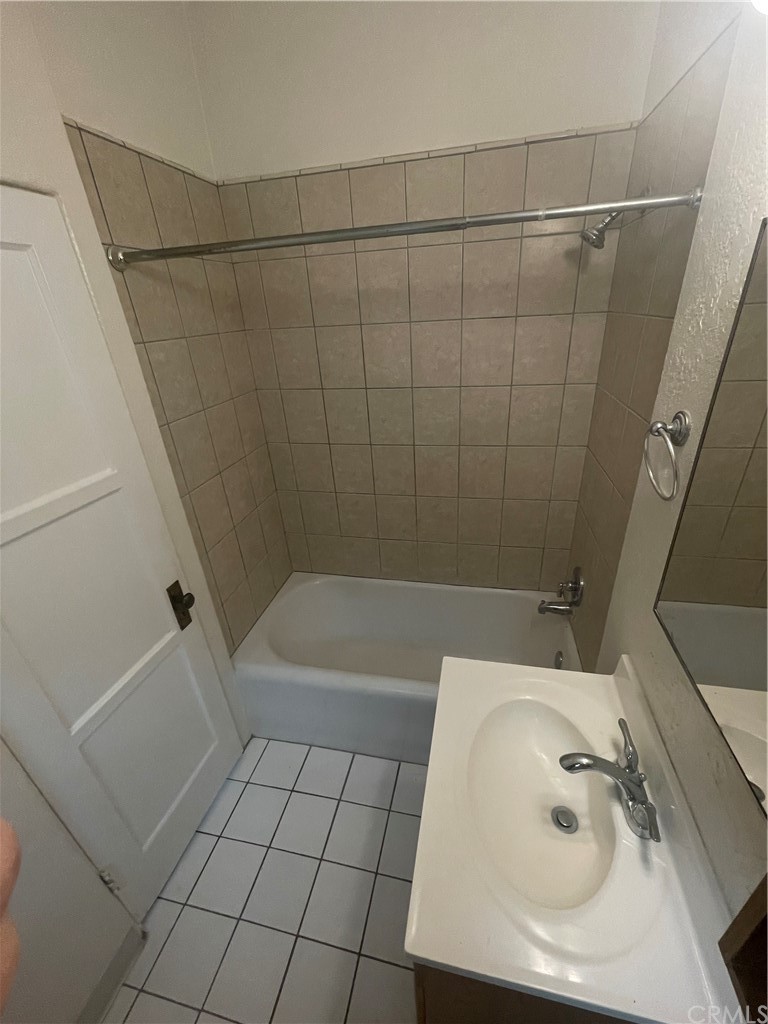 2802 Ocean Drive Manhattan Beach, CA 90266 - Photo 21 of 22 a bathroom with a sink a window and shower