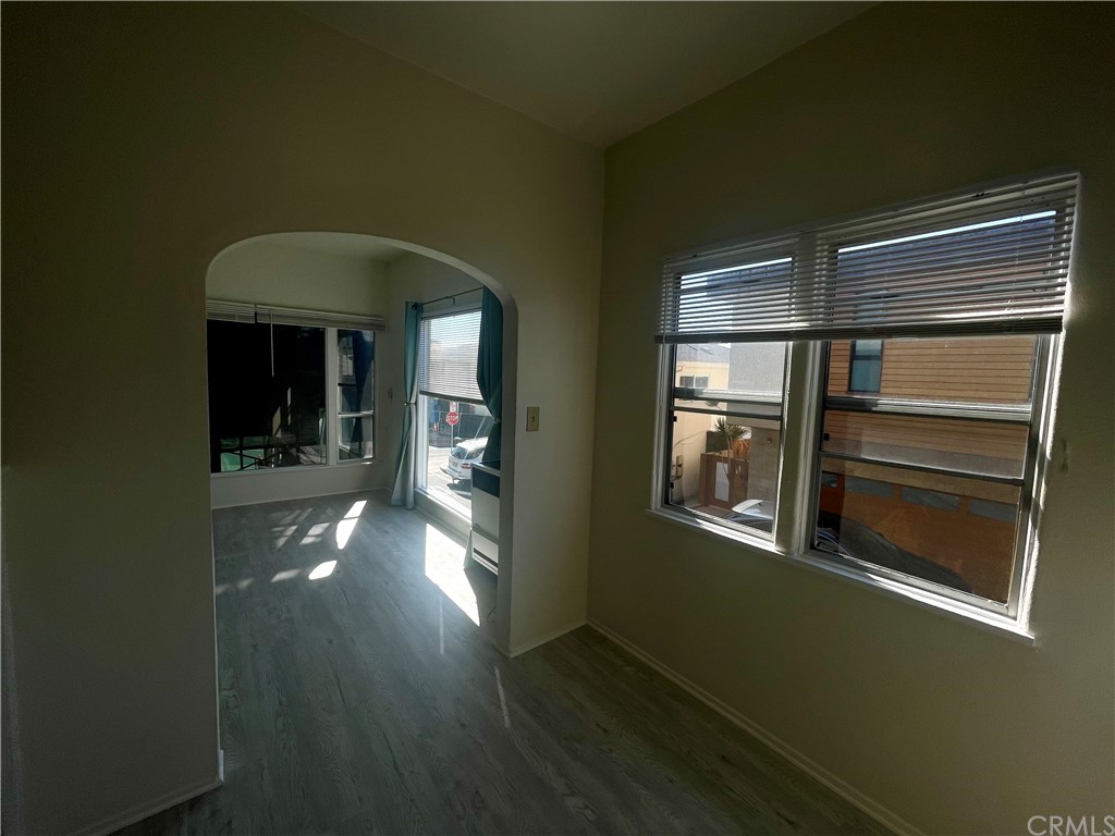 2802 Ocean Drive Manhattan Beach, CA 90266 - Photo 9 of 22 a view of empty room with wooden floor and windows