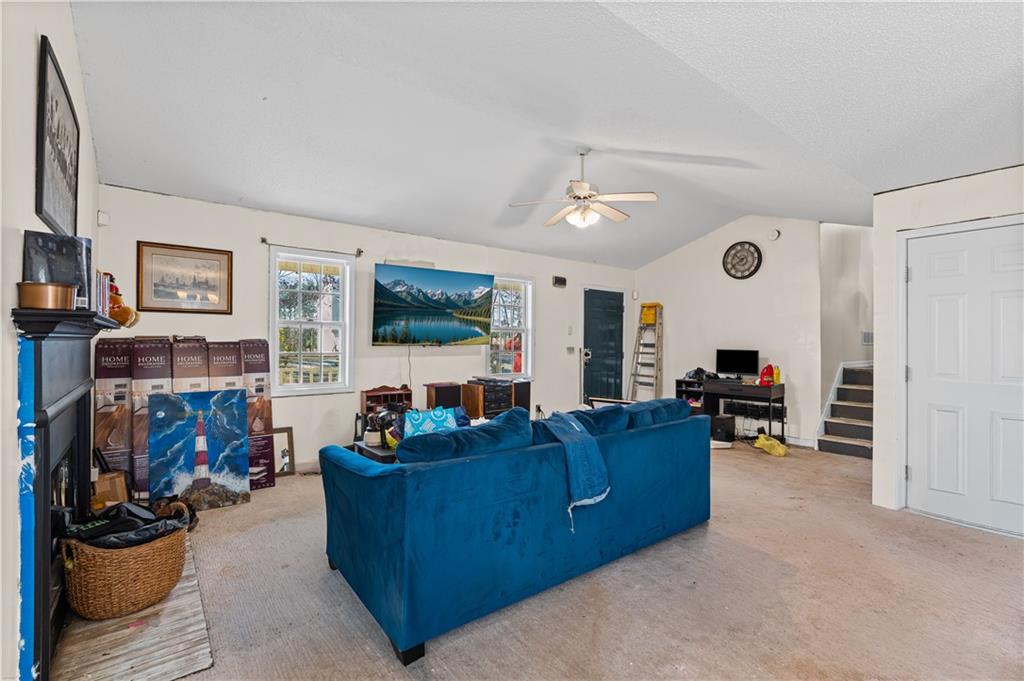 115 Cash Way Rockmart, GA 30153 - Photo 11 of 35 a living room with furniture and a flat screen tv