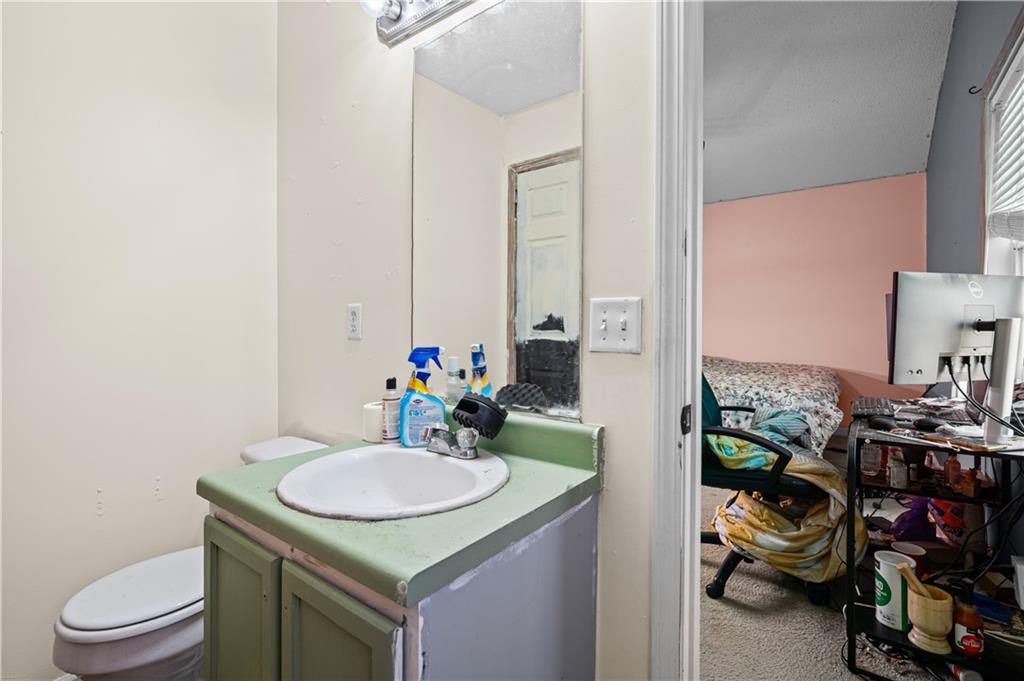 115 Cash Way Rockmart, GA 30153 - Photo 21 of 35 a bathroom with a sink and a mirror