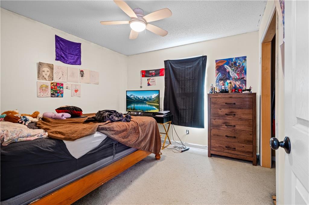 115 Cash Way Rockmart, GA 30153 - Photo 23 of 35 a bedroom with furniture and a walk in closet