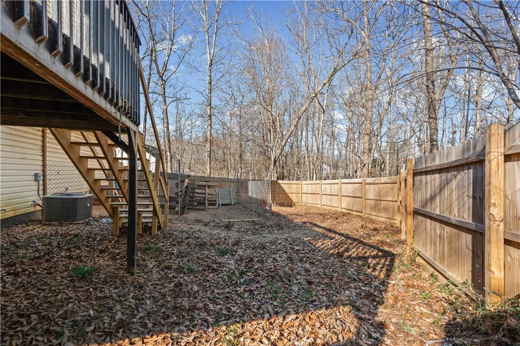 115 Cash Way Rockmart, GA 30153 - Photo 28 of 35 a backyard of a house with lots of green space