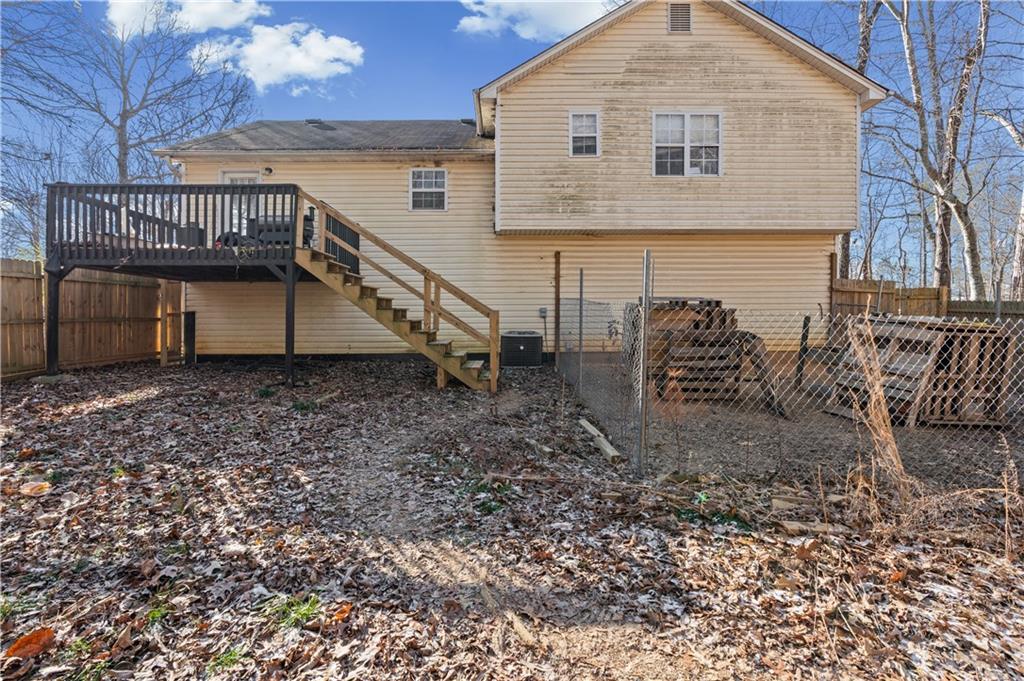 115 Cash Way Rockmart, GA 30153 - Photo 31 of 35 a view of a house with a yard and roof deck