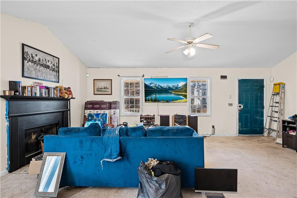 115 Cash Way Rockmart, GA 30153 - Photo 10 of 35 a living room with furniture and a flat screen tv