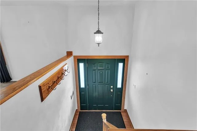 a view of a hallway with entryway