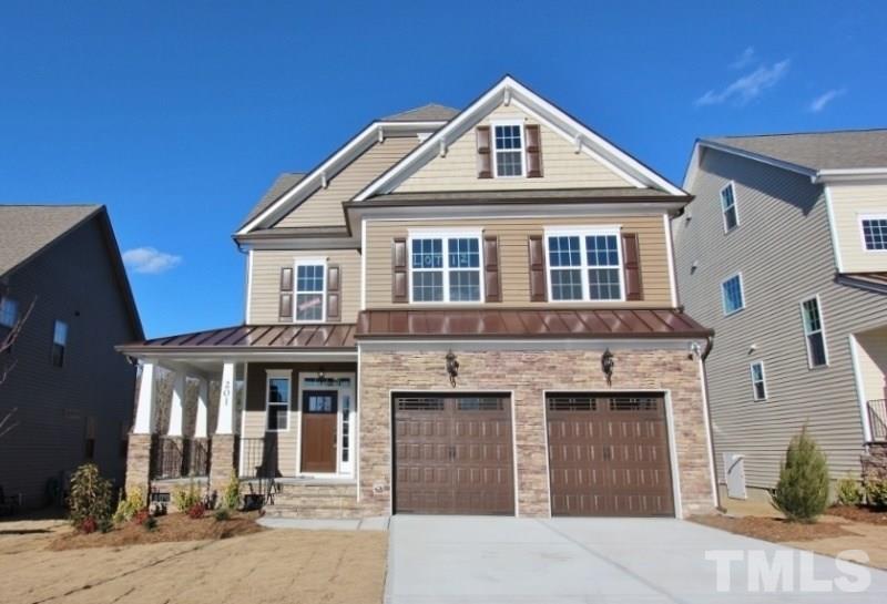 201 Virginia Water Drive Rolesville, NC 27571 - Photo 1 of 25 a front view of a house with a yard