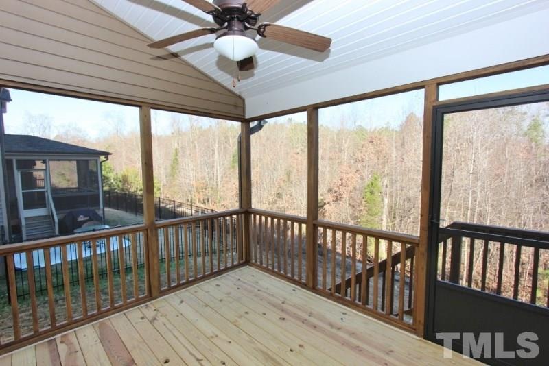 201 Virginia Water Drive Rolesville, NC 27571 - Photo 21 of 25 a view of a balcony with wooden floor