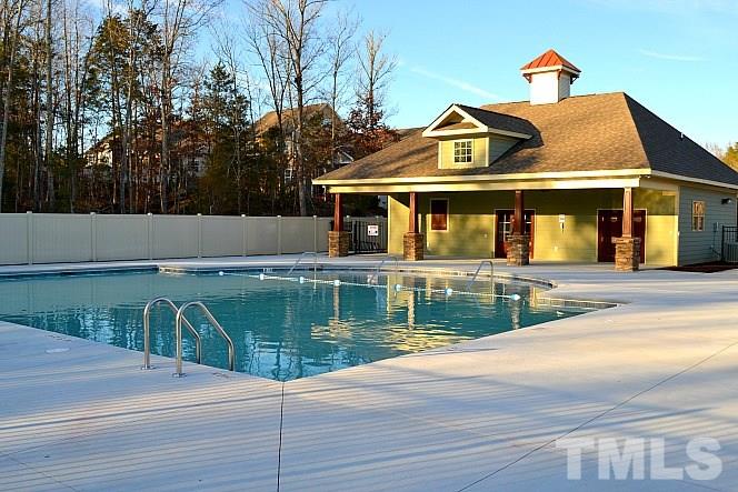201 Virginia Water Drive Rolesville, NC 27571 - Photo 24 of 25 a front view of a house with garden