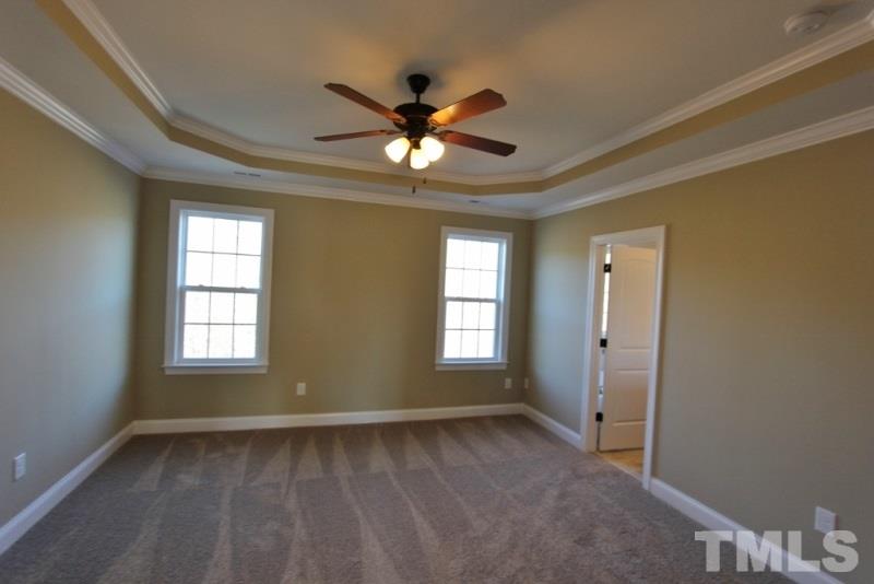 201 Virginia Water Drive Rolesville, NC 27571 - Photo 10 of 25 a view of a livingroom with a window