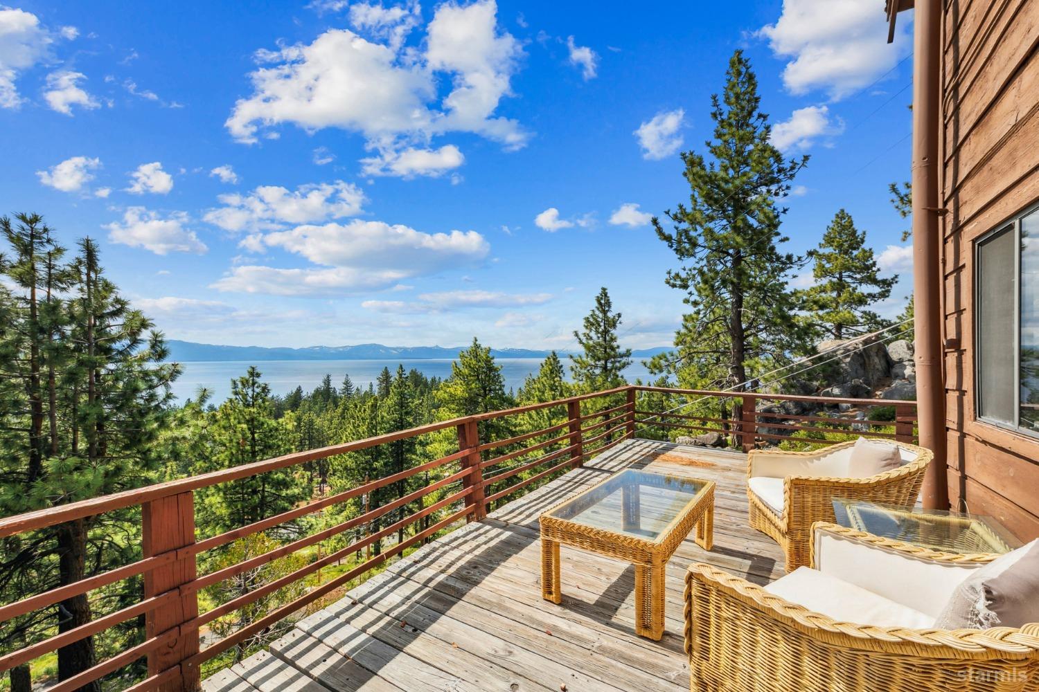 631 Point Road Zephyr Cove, NV 89448 - Photo 13 of 28 a view of a balcony with wooden floor and city view