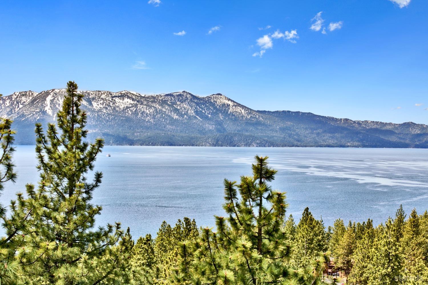 631 Point Road Zephyr Cove, NV 89448 - Photo 14 of 28 a view of a lake with a mountain in the background